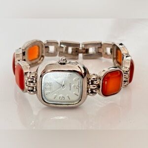 China silver tone orange gems watch new battery